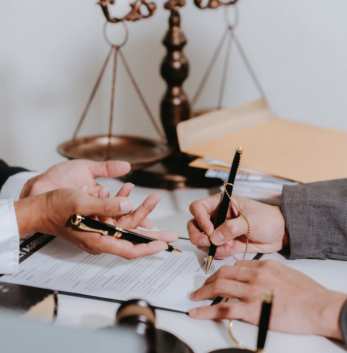 Business agreement signing scene